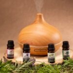 Wooden diffuser with essential oils, perfect for relaxation and aromatherapy needs.