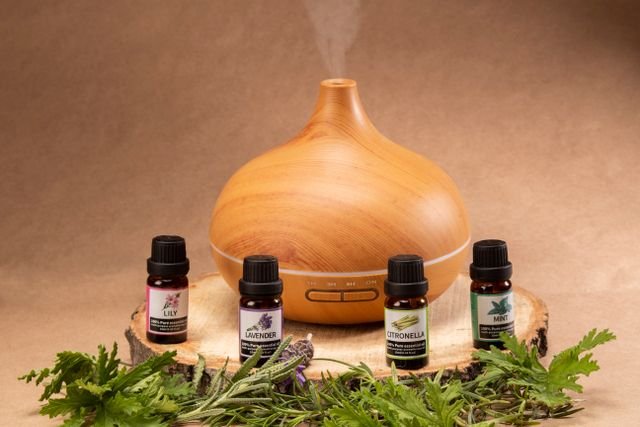Wooden diffuser with essential oils, perfect for relaxation and aromatherapy needs.